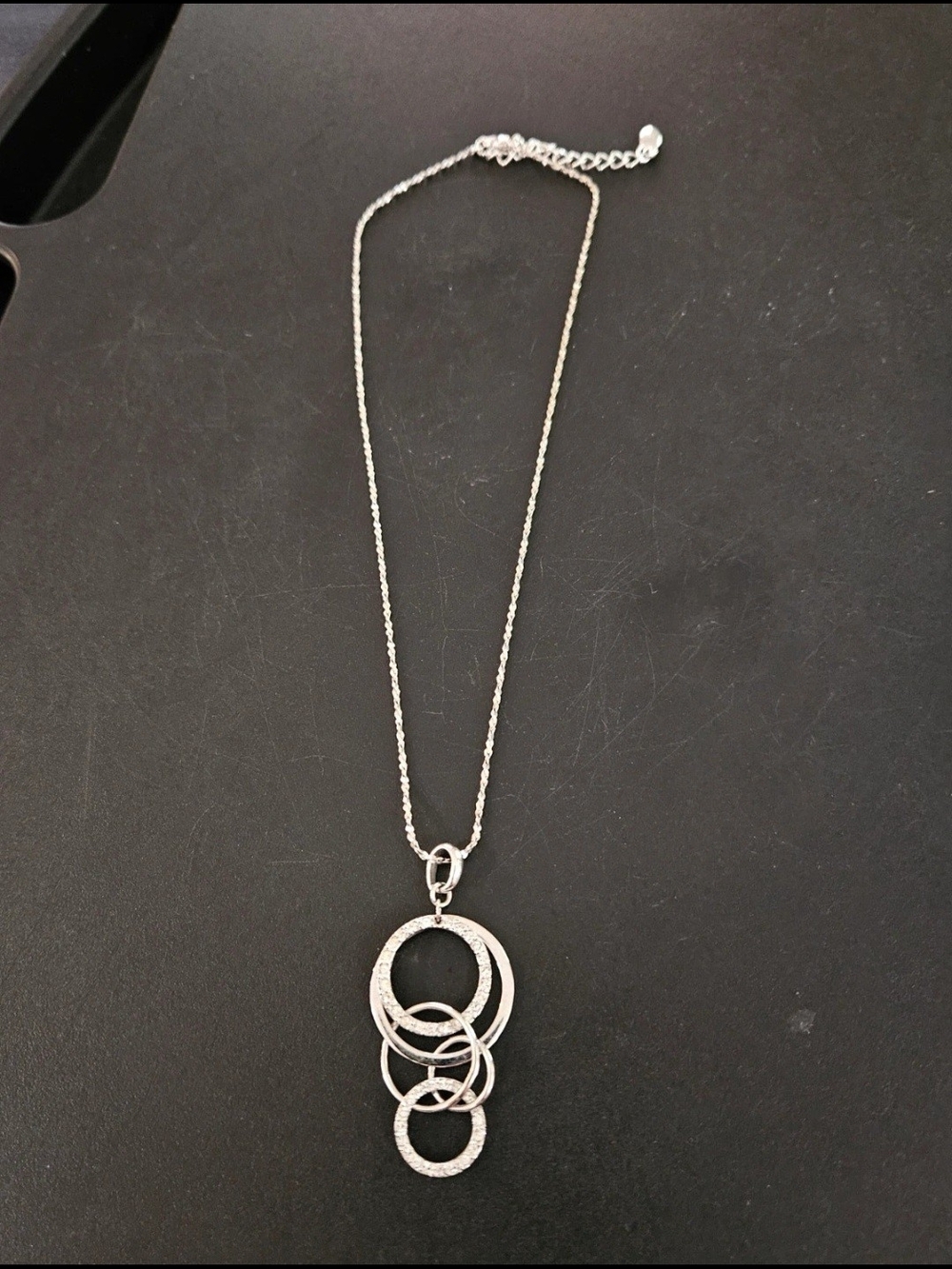 Annaleece silver-tone necklace with dangling circular charms